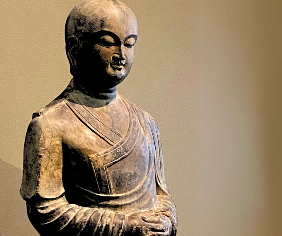 Serene Japanese Buddha statue representing aesthetic traditions that survived natural disasters and social change